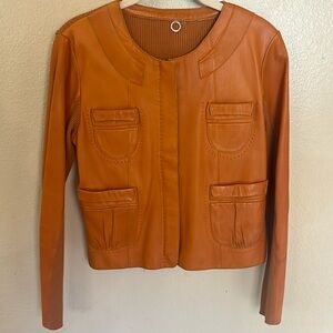 One Girl Who Rust Colored Leather Jacket S Pockets